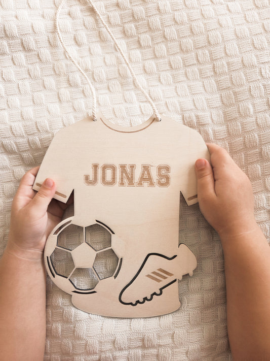 Personalisiertes Trikot aus Holz mit Namen graviert