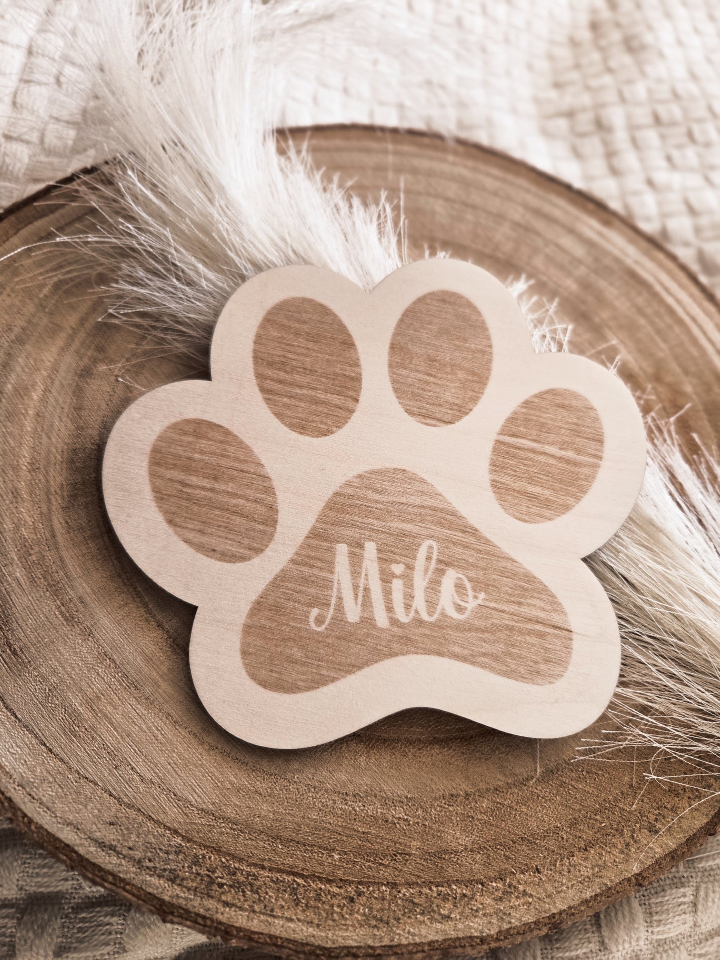 Tierpfote mit Namensgravur