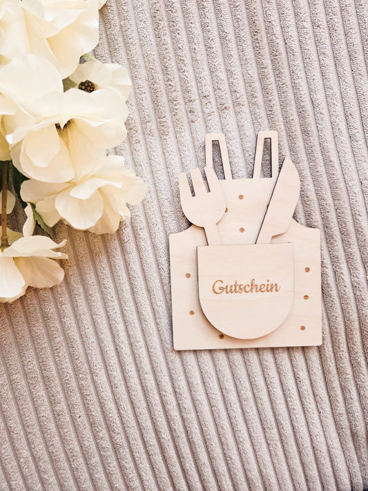 Gutschein Schürze mit Holzbesteck