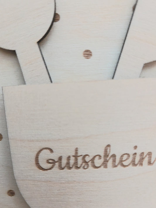 Gutschein Schürze mit Holzbesteck